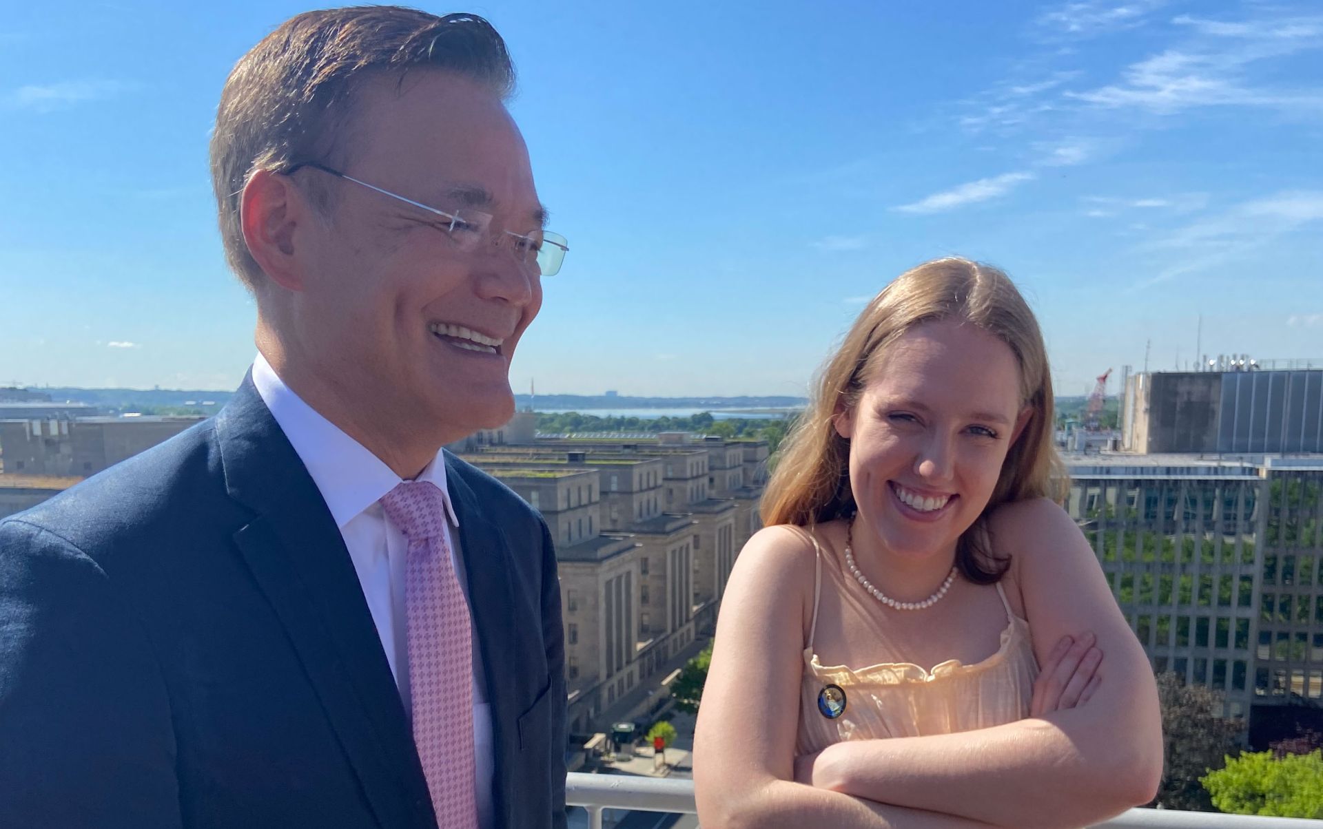 program director and student laughing