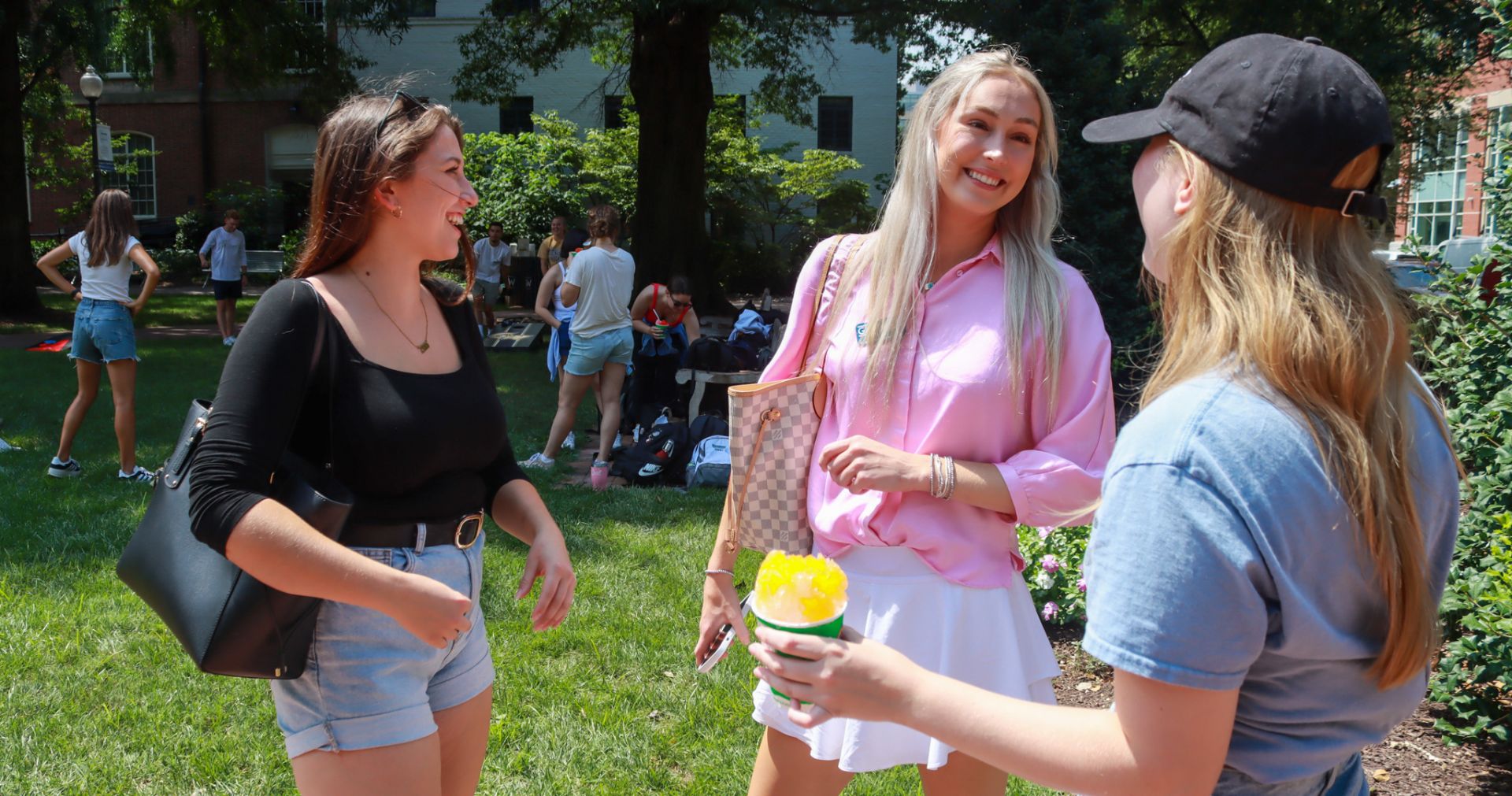 students smiling outside