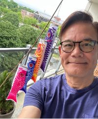 Roger Ideishi and koi fish flags