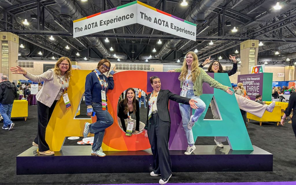 OT Students with AOTA Sign