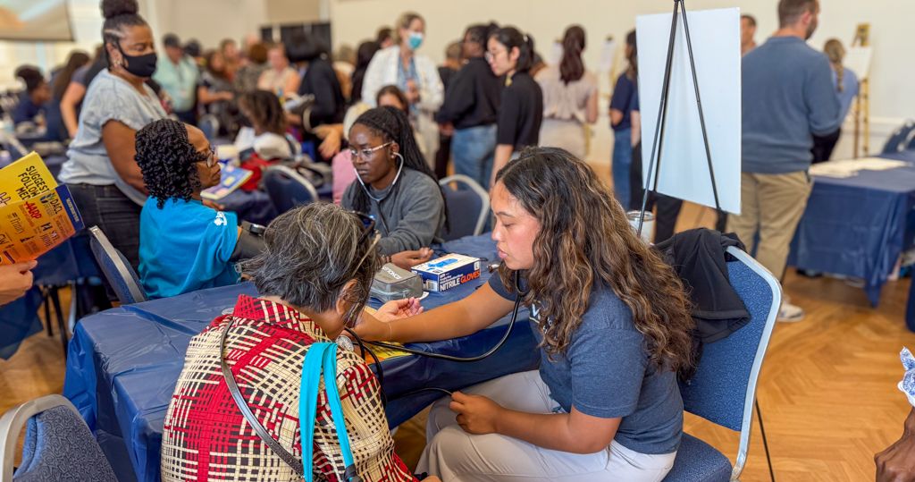 OT student Annika Ututalum at check in of Falls Prevention Awareness Day