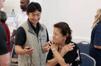 Student leading Seat Exercise at Falls Prevention Awareness Day